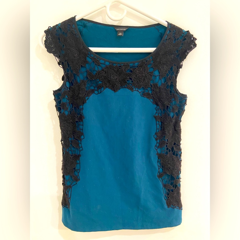 Blue top with black trace details